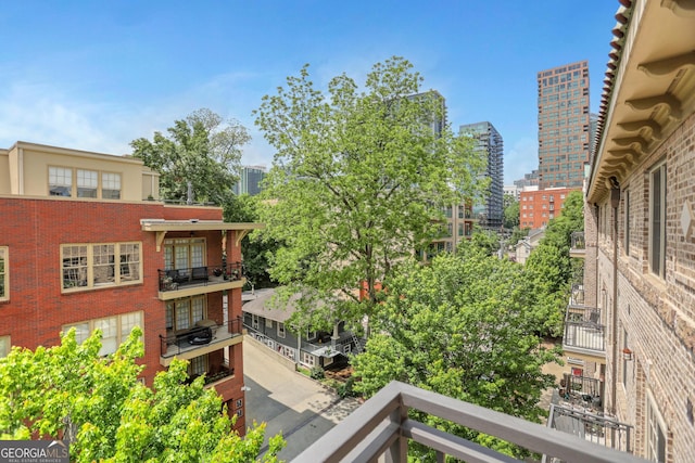 balcony featuring a view of city