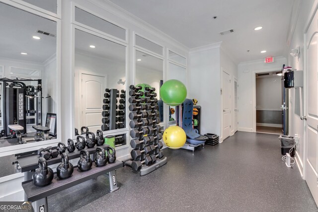 workout area with crown molding and recessed lighting