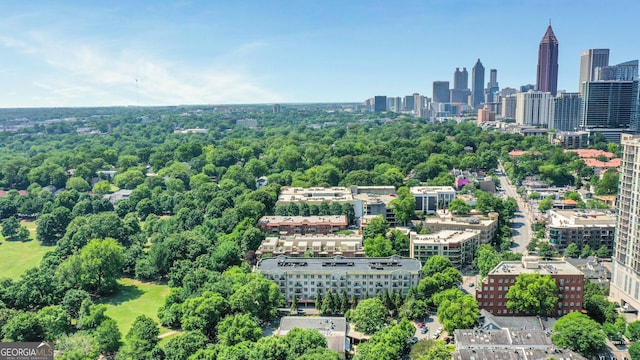 drone / aerial view of a skyline view and a tree filled landscape