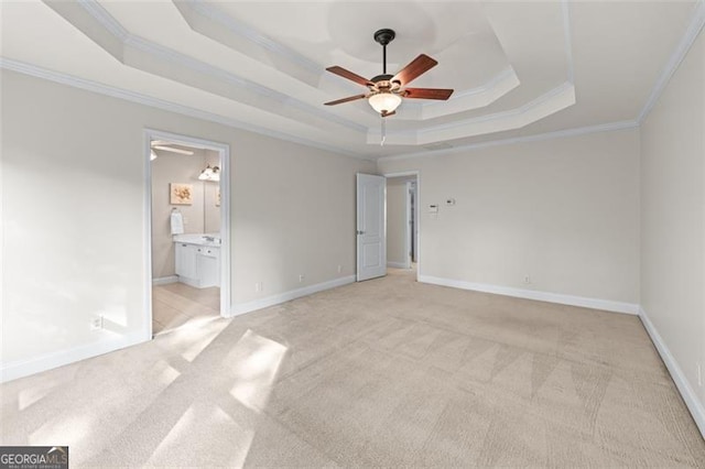 4876 Sara Creek Way, Sugar Hill, GA 30518 - unfurnished bedroom with crown molding, light colored carpet, a raised ceiling, and ensuite bath