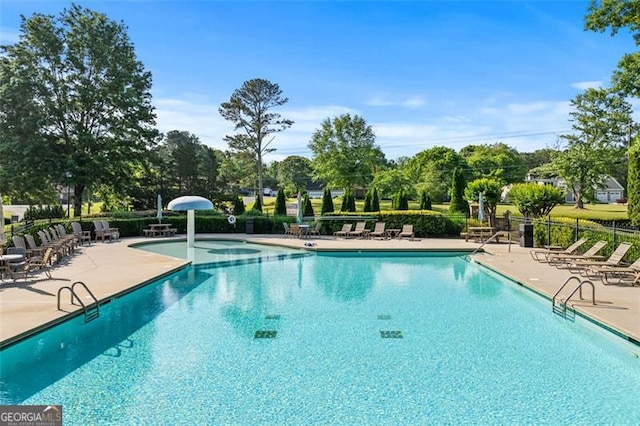 4876 Sara Creek Way, Sugar Hill, GA 30518 - pool with fence and a patio area