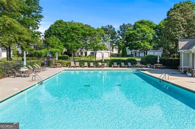 4876 Sara Creek Way, Sugar Hill, GA 30518 - community pool featuring a patio area and fence