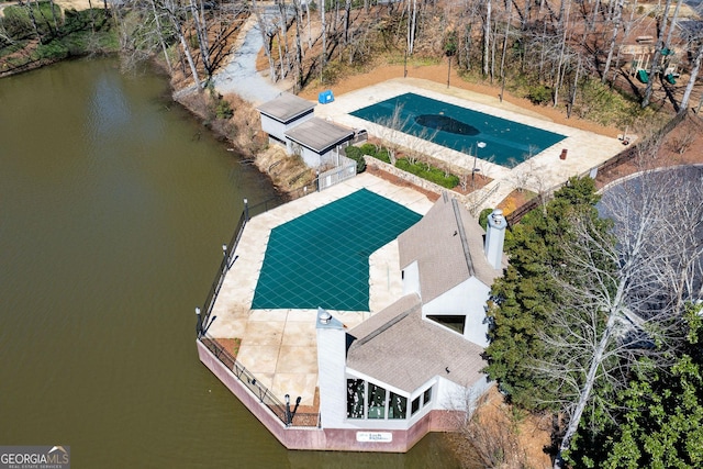drone / aerial view with a water view