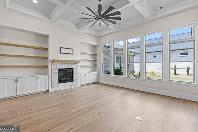 2824 Cork St, Braselton, GA 30517 - unfurnished living room with a ceiling fan, light wood-style floors, baseboards, built in shelves, and a stone fireplace