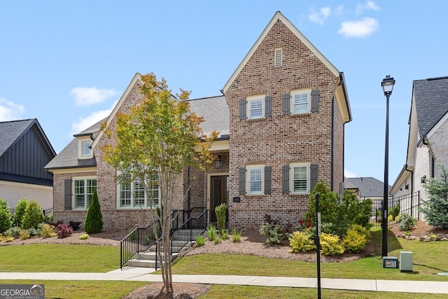 2824 Cork St, Braselton, GA 30517 - view of front of house with brick siding and a front lawn