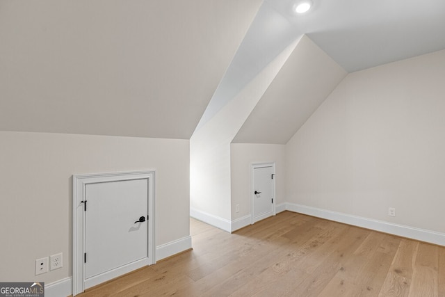 2824 Cork St, Braselton, GA 30517 - bonus room featuring lofted ceiling, light wood-style floors, baseboards, and recessed lighting