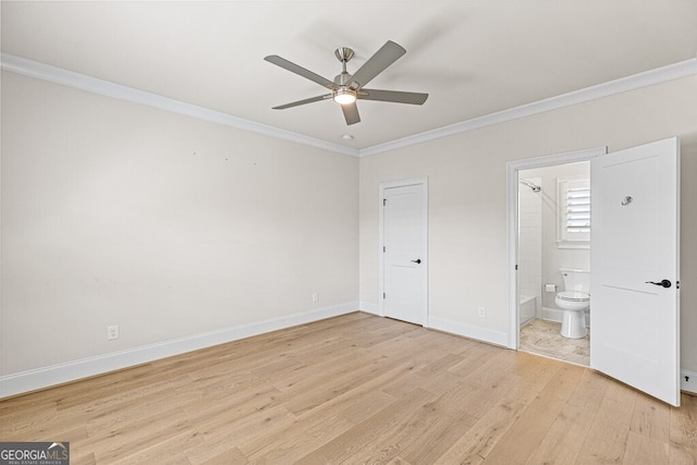 2824 Cork St, Braselton, GA 30517 - unfurnished bedroom with crown molding, light wood-type flooring, ensuite bathroom, baseboards, and a ceiling fan
