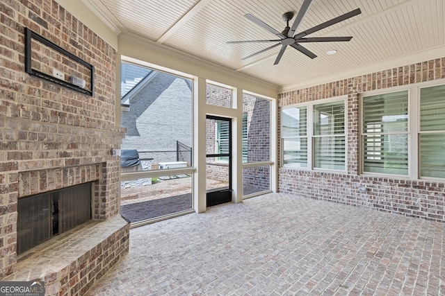 2824 Cork St, Braselton, GA 30517 - unfurnished sunroom featuring a ceiling fan and an outdoor brick fireplace