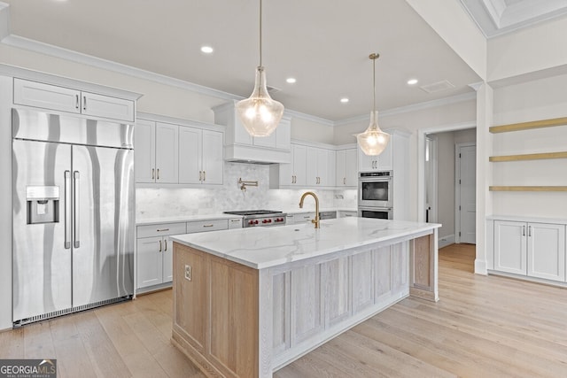 2824 Cork St, Braselton, GA 30517 - kitchen featuring appliances with stainless steel finishes, light wood-style flooring, ornamental molding, backsplash, and recessed lighting