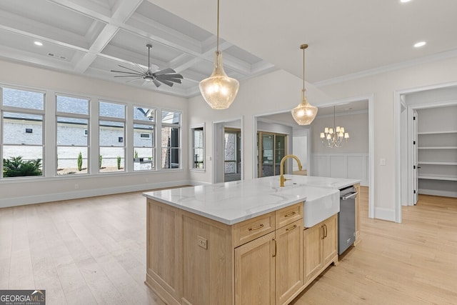 2824 Cork St, Braselton, GA 30517 - kitchen with a sink, light brown cabinetry, light wood-type flooring, dishwasher, and light stone counters