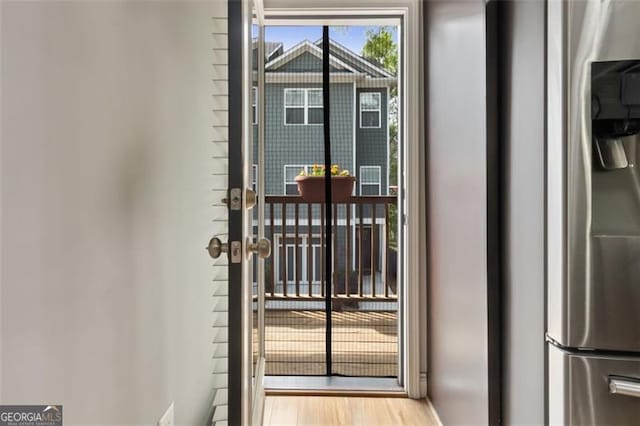 1365 Memorial Dr SE Unit # 12, Atlanta, GA 30317 - kitchen view of stainless steel fridge and wood finished floors