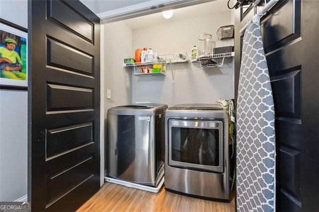 1365 Memorial Dr SE Unit # 12, Atlanta, GA 30317 - laundry area featuring washer and clothes dryer and light wood finished floors