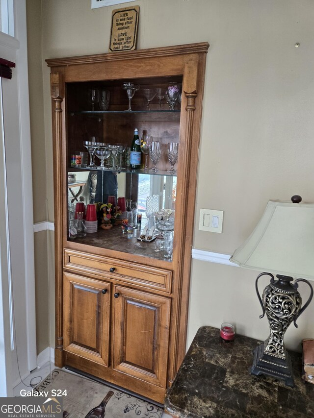 1280 W Peachtree St NW Apt 2606, Atlanta, GA 30309 - bar featuring light tile patterned flooring