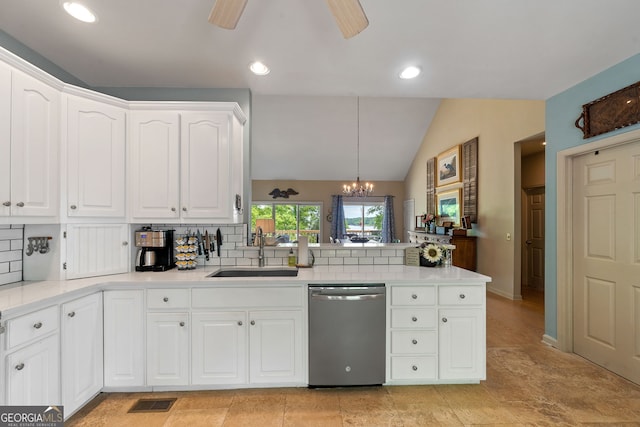 945 Sandy Run Dr, Sparta, GA 31087 - kitchen featuring a sink, decorative backsplash, stainless steel dishwasher, and a peninsula