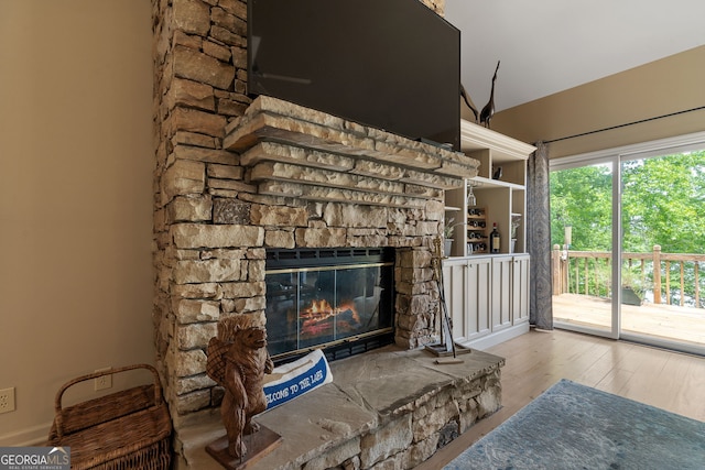 945 Sandy Run Dr, Sparta, GA 31087 - living area featuring wood finished floors and a fireplace