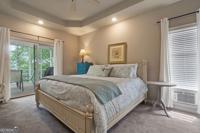 945 Sandy Run Dr, Sparta, GA 31087 - carpeted bedroom featuring an AC wall unit, access to outside, a ceiling fan, and recessed lighting