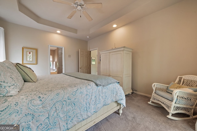 945 Sandy Run Dr, Sparta, GA 31087 - carpeted bedroom with baseboards, a ceiling fan, a tray ceiling, and recessed lighting