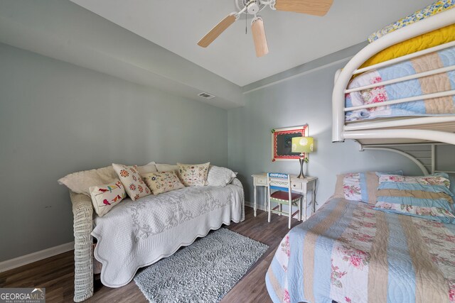 945 Sandy Run Dr, Sparta, GA 31087 - bedroom with baseboards, ceiling fan, wood finished floors, and visible vents