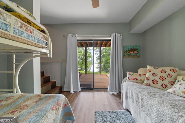 945 Sandy Run Dr, Sparta, GA 31087 - bedroom with a ceiling fan, access to exterior, and wood finished floors
