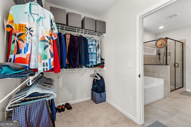 walk in closet featuring visible vents