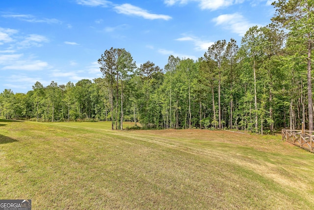 view of yard with a forest view