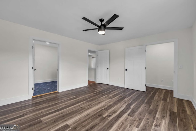233 Bradshaw Rd, Hiawassee, GA 30546 - unfurnished bedroom featuring baseboards, ceiling fan, and wood finished floors