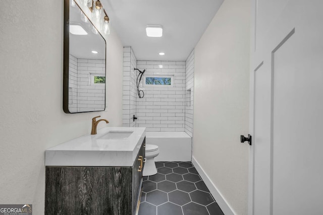 233 Bradshaw Rd, Hiawassee, GA 30546 - full bathroom featuring shower / bath combination, tile patterned floors, baseboards, vanity, and toilet