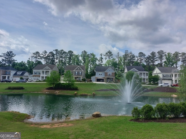 view of water feature with a residential view