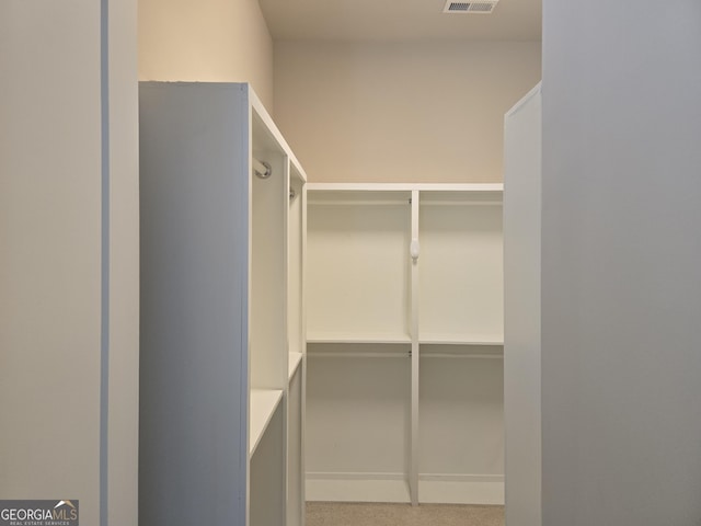 walk in closet featuring visible vents