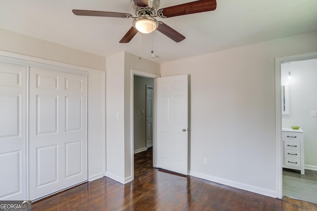 unfurnished bedroom featuring baseboards, ceiling fan, a closet, and wood finished floors