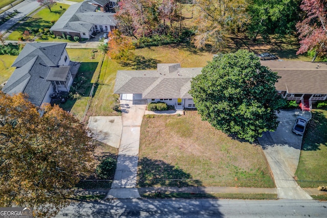 birds eye view of property with a residential view