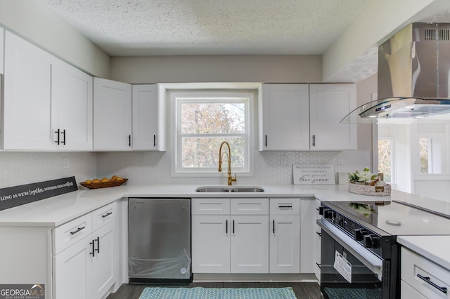 kitchen with a sink, wall chimney range hood, dishwashing machine, a healthy amount of sunlight, and black range with electric cooktop