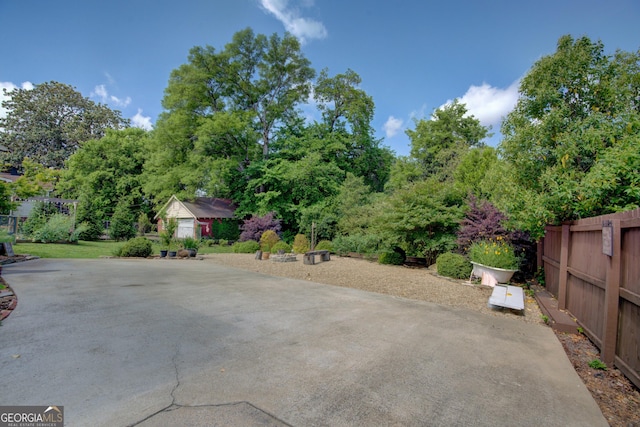 view of patio featuring fence