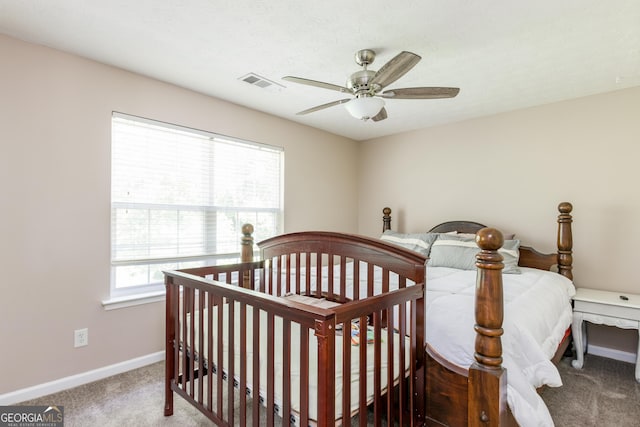 314 Meadows Ln, Canton, GA 30114 - bedroom with carpet, baseboards, and a ceiling fan