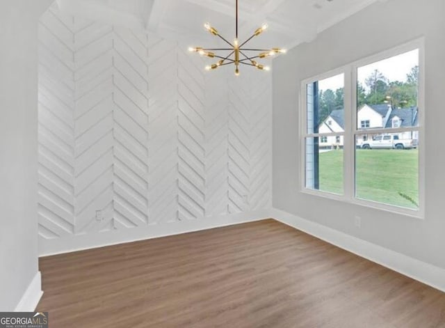 3312 Mill Forest Dr, Conyers, GA 30094 - unfurnished dining area featuring a healthy amount of sunlight, baseboards, wood finished floors, and a chandelier