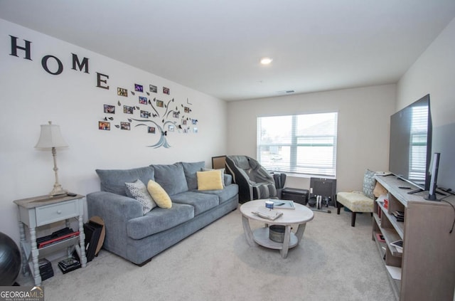 carpeted living room with visible vents