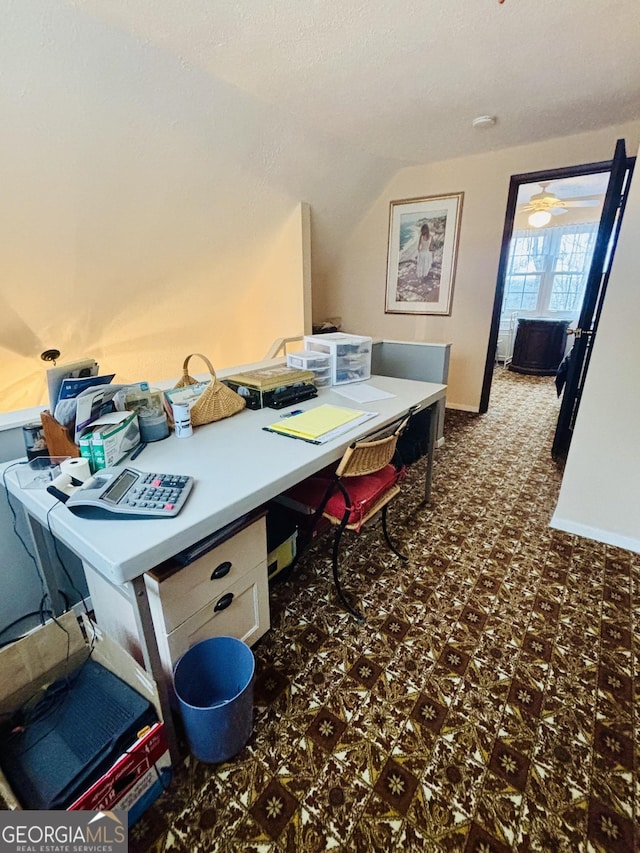 office with baseboards and vaulted ceiling