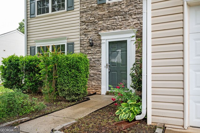 3230 Deer Valley Dr NW, Acworth, GA 30101 - view of exterior entry featuring stone siding
