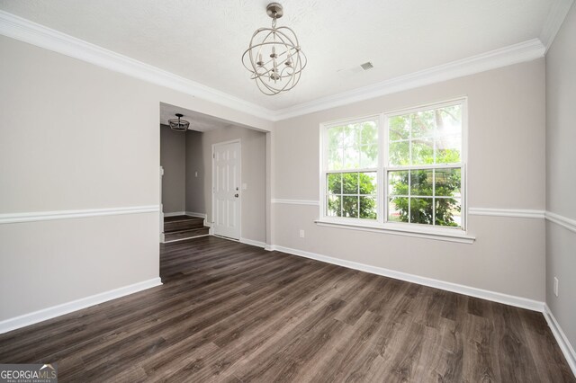 3230 Deer Valley Dr NW, Acworth, GA 30101 - unfurnished room featuring a chandelier, baseboards, dark wood finished floors, and ornamental molding