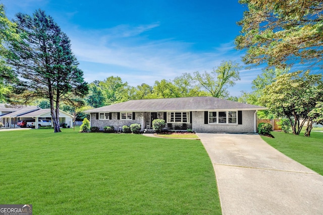 single story home with fence, concrete driveway, and a front yard