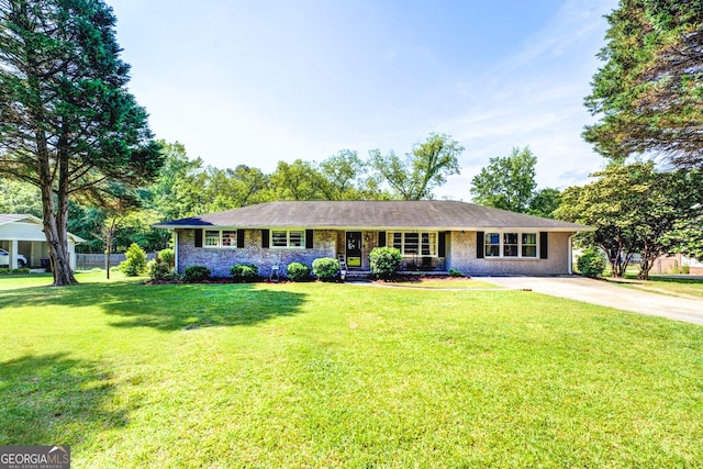 5327 David Cir SE, Covington, GA 30014 - single story home with driveway and brick siding