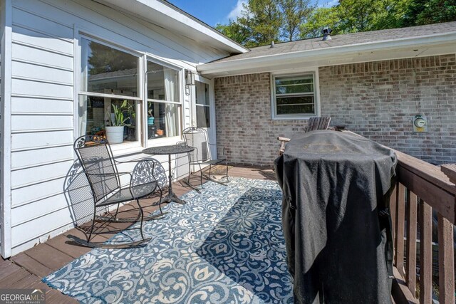 5327 David Cir SE, Covington, GA 30014 - wooden terrace with a grill