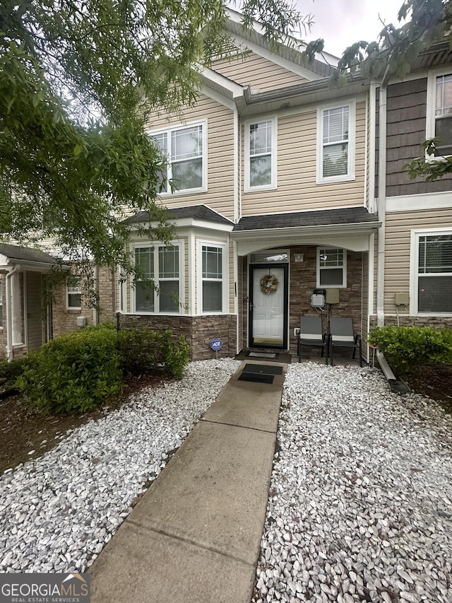 view of front of property featuring stone siding