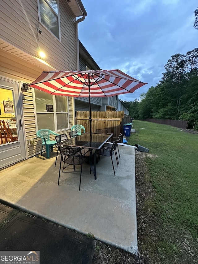 view of patio / terrace with fence