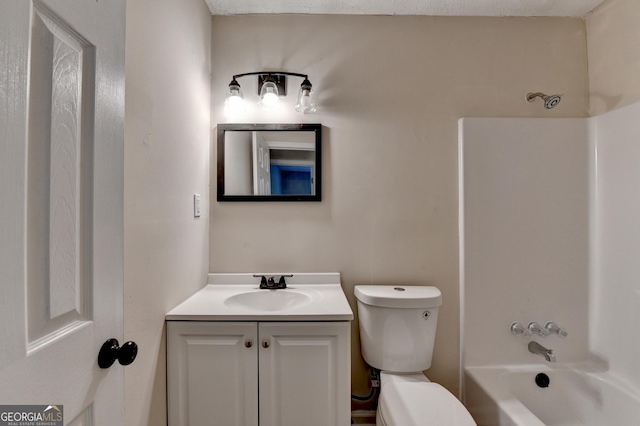 bathroom with vanity,  shower combination, and toilet