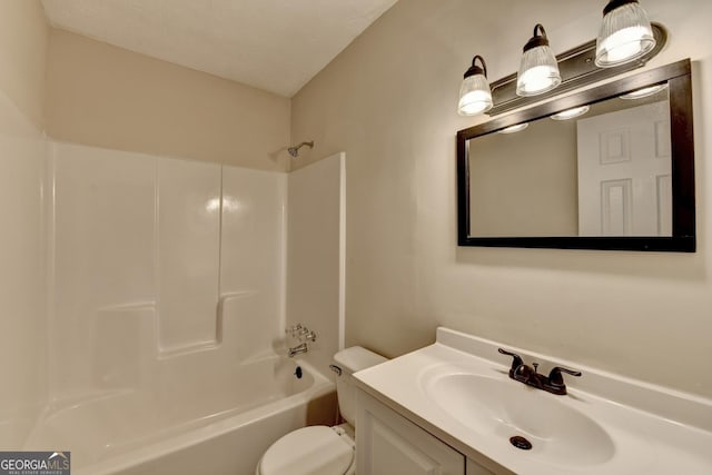 full bath with toilet, bathtub / shower combination, and vanity