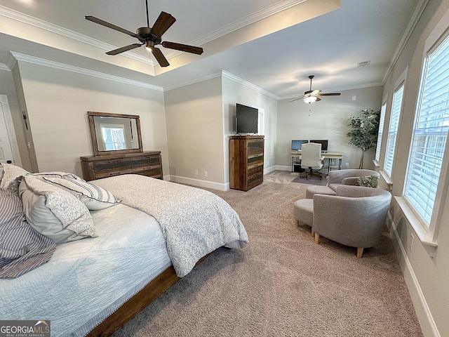carpeted bedroom with crown molding, baseboards, a ceiling fan, and visible vents