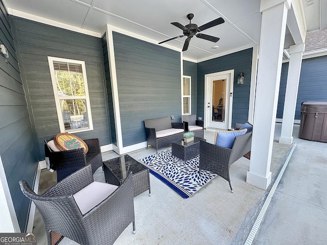 view of patio / terrace with an outdoor living space and ceiling fan