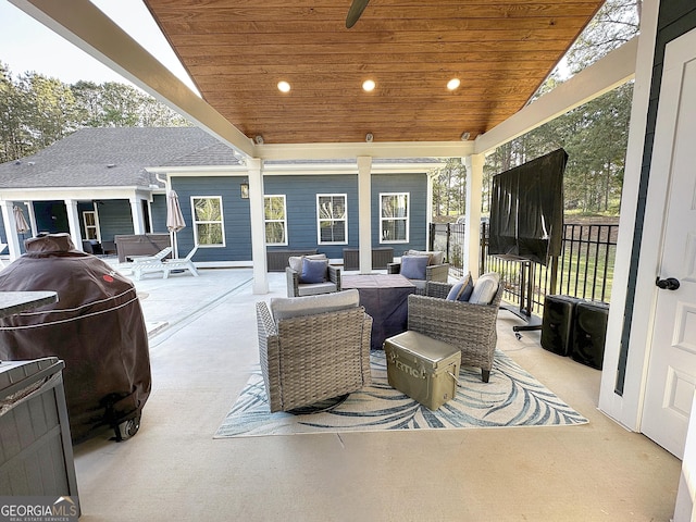 view of patio with an outdoor hangout area and a grill