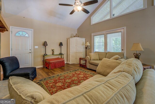 2787 Turtle Cove Trwy, Monticello, GA 31064 - living area with high vaulted ceiling, ceiling fan, wood finished floors, and baseboards